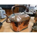 A large early 19thC. over fire copper hot water ke