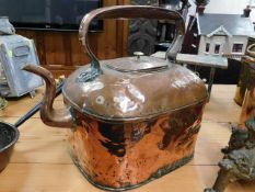 A large early 19thC. over fire copper hot water ke