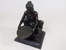 A good small bronze depicting Burmese woman pannin