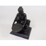 A good small bronze depicting Burmese woman pannin