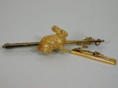 A yellow metal rabbit brooch set with diamond