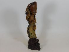 A 19thC. Asian soapstone carved figure with plinth