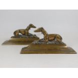 A pair of 19thC. brass running dog mantle ends