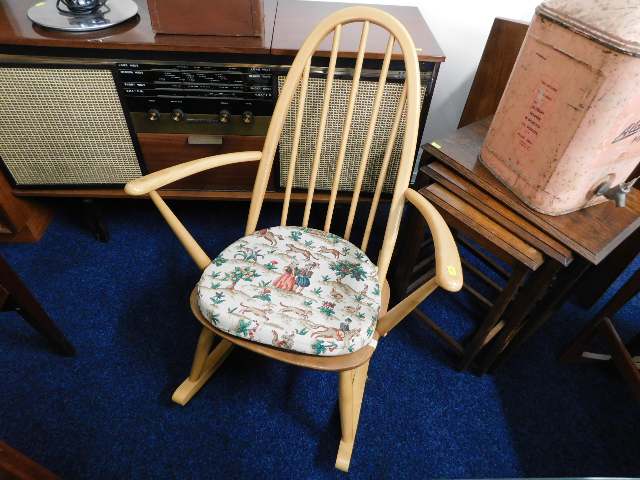 A Ercol childs light elm rocking chair