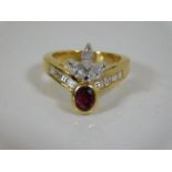 An 18ct ring set with approx. 1.5ct diamonds & 0.5ct ruby