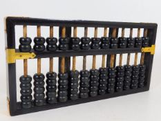 A Chinese wooden abacus