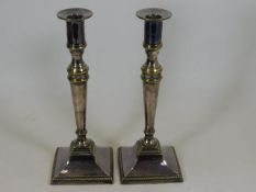 A pair of 19thC. silver plated candle sticks
