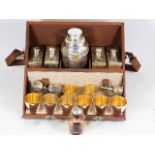 A 1950's silver plated travel cocktail set with ei