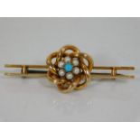 A yellow metal Victorian brooch set with turquoise