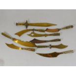 A collection of nine brass WW1 trench art knives