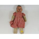 An early 20thC. doll indistinctly signed to nape o