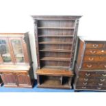 A large 19thC. oak bookcase with pine back panels