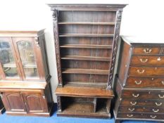 A large 19thC. oak bookcase with pine back panels