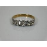 A 9ct ring set with white stones