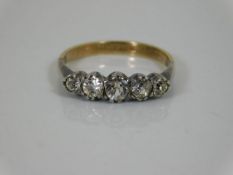 A 9ct ring set with white stones