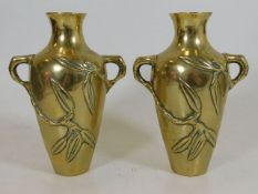 A pair of polished bronze Japanese vases, approx.