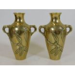 A pair of polished bronze Japanese vases, approx.