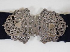 A 19thC. ornate silver nurses buckle with belt