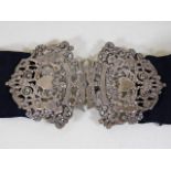 A 19thC. ornate silver nurses buckle with belt