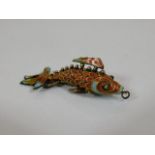 A gilt metal reticulated enamelled fish