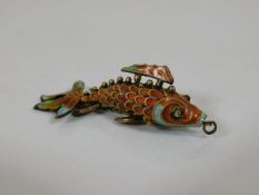 A gilt metal reticulated enamelled fish