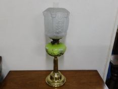 A Victorian opaline glass oil lamp on brass base w