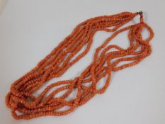 A Victorian six strand set of coral bead necklace