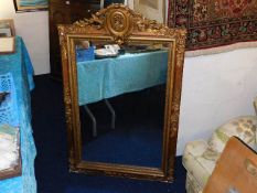 A large 19thC. gilt framed mirror approx. 45in x 3