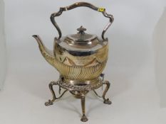 A silver plated spirit kettle with inscription of