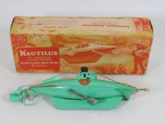 A boxed tinplate Sutcliffe Nautilus submarine toy