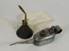 A Muller & Co. modellers oil can twinned with one