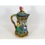 A large 19thC. Minton majolica pitcher with jester