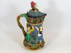 A large 19thC. Minton majolica pitcher with jester
