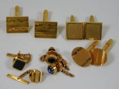 Four pairs of cuff links twinned with four collar