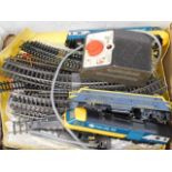A boxed quantity of Hornby track, train & related