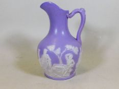 A 19thC. lilac jasperware style jug