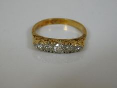 An 18ct gold & five stone diamond ring