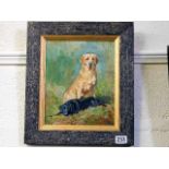 A well executed framed oil depicting two labrador
