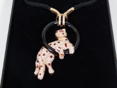 A fine quality 18ct rose gold Cartier style panther pendant necklace encrusted with diamonds & rubie