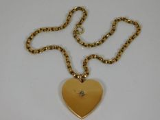 An antique 18ct gold heart shaped pendant set with