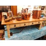 A large shabby chic coffee table with eight drawer