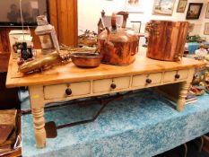 A large shabby chic coffee table with eight drawer