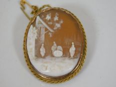 A Victorian gold mounted cameo with Italian villag