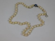 A set of vintage cultured pearls with blue stone c