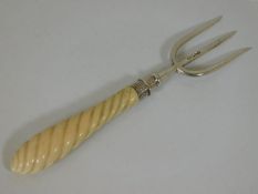 An ivory handled silver toasting fork