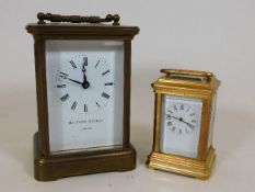 A Matthew Norman brass carriage clock twinned with