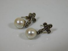 A set of early 20thC. cultured pearl drop earrings