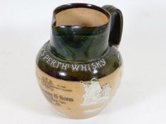 A Royal Doulton stoneware jug advertising Dewar's