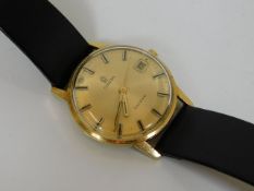 An 18ct gold gents Omega geneve wrist watch