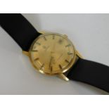 An 18ct gold gents Omega geneve wrist watch